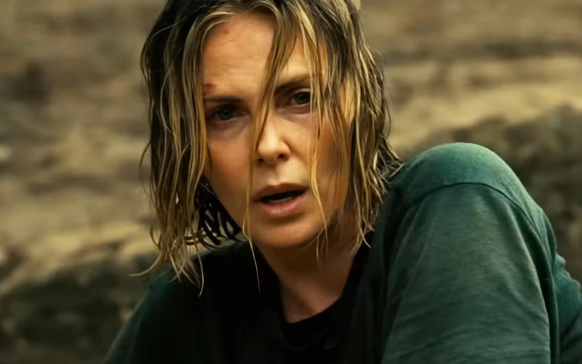 Charlize Theron no filme O Jogo do Predador